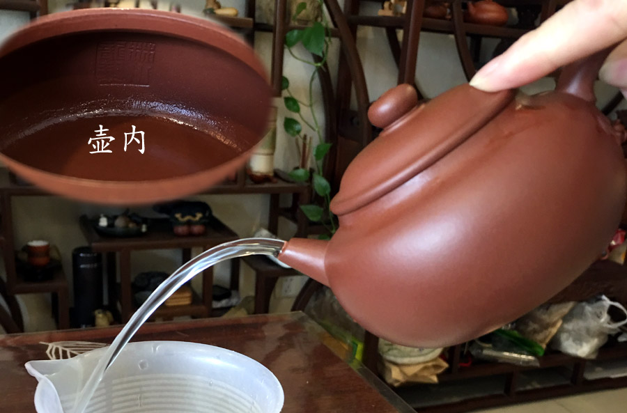 林小龙古泉紫砂壶出水照